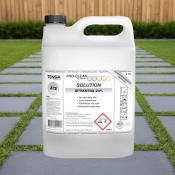 Ättiksyra 24% med bakgrund trädgårdsgång